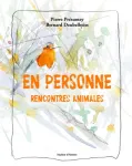 En personne