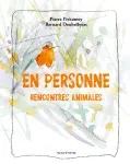 En personne